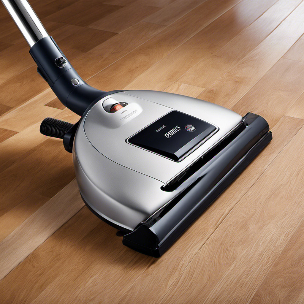 An image that showcases a sleek, modern vacuum effortlessly gliding across a gleaming hardwood floor, effortlessly capturing every last strand of pet hair