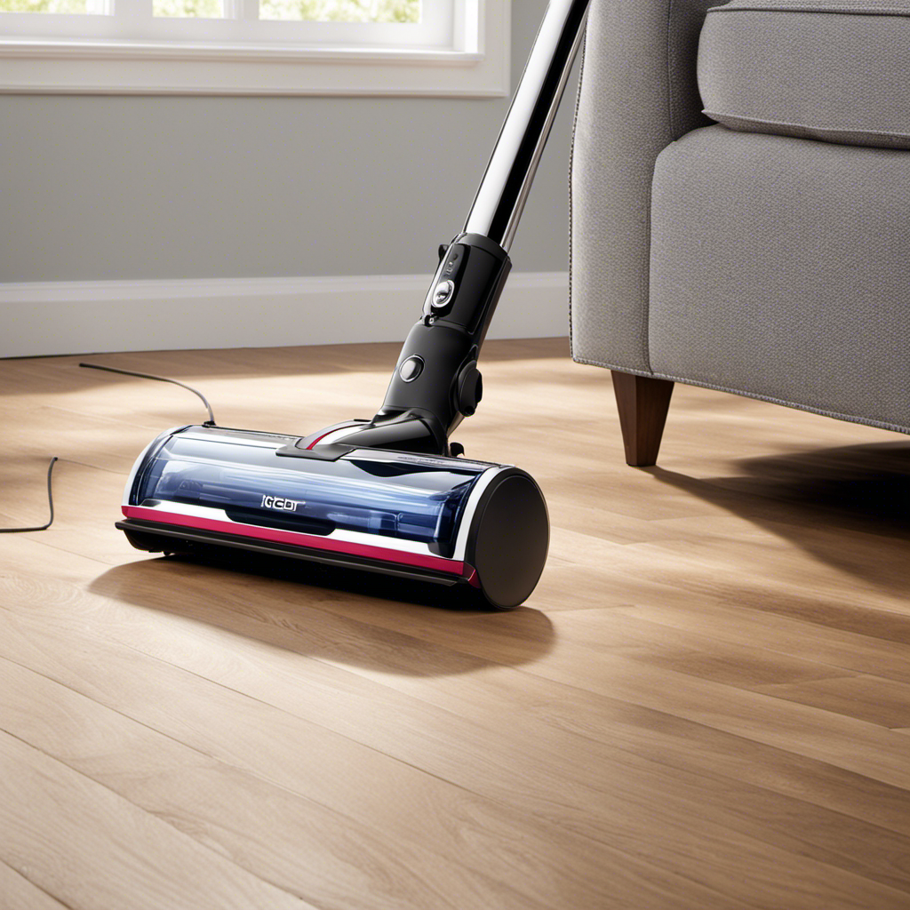 An image that showcases a sleek stick vacuum effortlessly gliding over pristine hardwood floors, effortlessly capturing pet hair