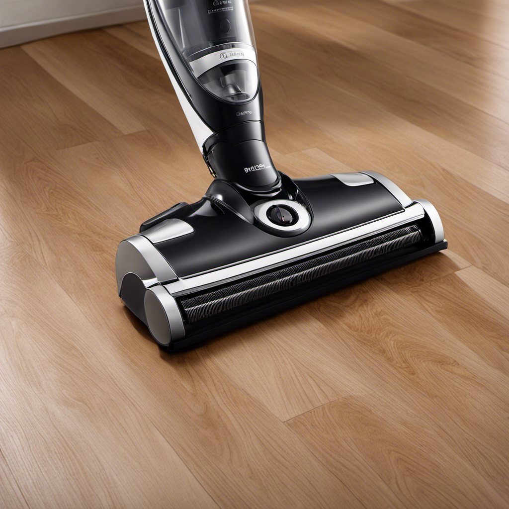 An image showcasing a sleek, modern vacuum gliding effortlessly across a pristine hardwood floor, capturing every single pet hair with precision