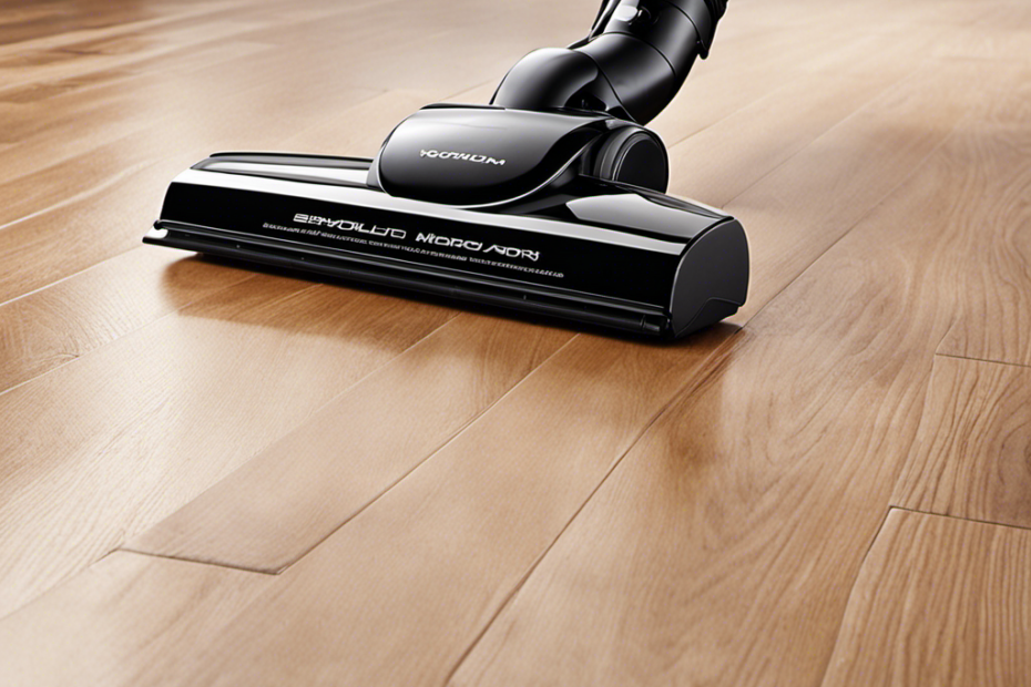 An image showcasing a sleek, modern vacuum effortlessly gliding over a pristine hardwood floor, while effectively removing stubborn pet hair