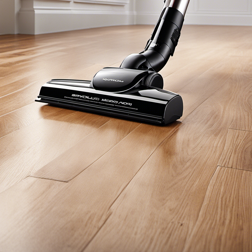 An image showcasing a sleek, modern vacuum effortlessly gliding over a pristine hardwood floor, while effectively removing stubborn pet hair